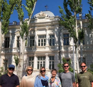 The author and her family visiting the last home (in Crimea) her grand parents stayed before leaving Russia forever.